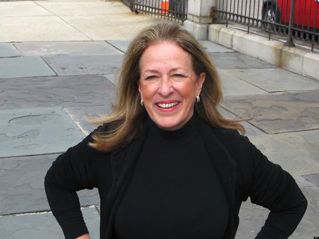 Elizabeth Colbert Busch poses on a street in Charleston, S.C., on Wednesday, February 13, 2013. The sister of comedian Stephen Colbert is one of two Democrats seeking South Carolina's vacant 1st District congressional seat. There are 16 Republicans in the race. (AP Photo/Bruce Smith)