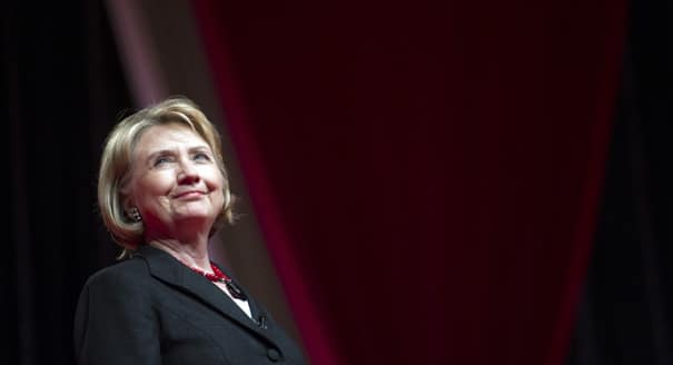 Former Secretary of State Hillary Rodham Clinton addresses the 51st Delta Sigma Theta National Convention in Washington, Tuesday, July 16, 2013. Clinton is offering her prayers for the family of Trayvon Martin and, in her words, "every family who loves someone who is lost to violence." Clinton says this week has brought "deep, painful heartache" to many Americans. She said no mother or father should ever have to fear for a child walking down a street in the United States. (AP Photo/Cliff Owen)