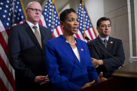 UNITED STATES - JANUARY 14: From left, Rep. Joe Crowley, D-N.Y., Vice Chair of the House Democratic Caucus, Donna Edwards, D-Md., and Rep. Xavier Becerra, D-Calif., Chairman, speak to the media after a meeting of the House Democratic Caucus in the Capitol Visitor Center. (Photo By Tom Williams/CQ Roll Call)