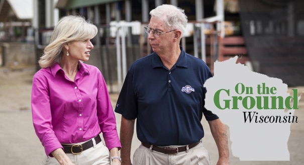 Wisconsin Democratic gubernatorial candidate Mary Burke, left, walks with Wisconsin Sen. Tim Cullen at the Rock County 4-H Fair, Thursday July 24, 2014, in Janesville, Wis. (AP Photo/Andy Manis)