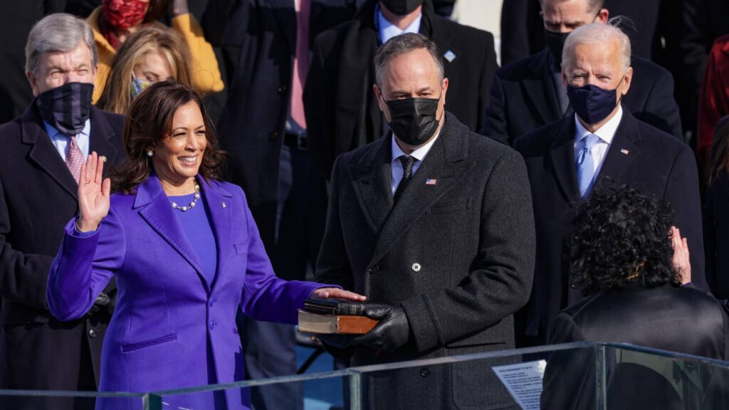 WASHINGTON, DC - JANUARY 20:  Kamala Harris is sworn as U.S. Vice President by U.S. Supreme Court Associate Justice Sonia Sotomayor as her husband Doug Emhoff looks on at the inauguration of U.S. President-elect Joe Biden on the West Front of the U.S. Capitol on January 20, 2021 in Washington, DC.  During today's inauguration ceremony Joe Biden becomes the 46th president of the United States. (Photo by Alex Wong/Getty Images)